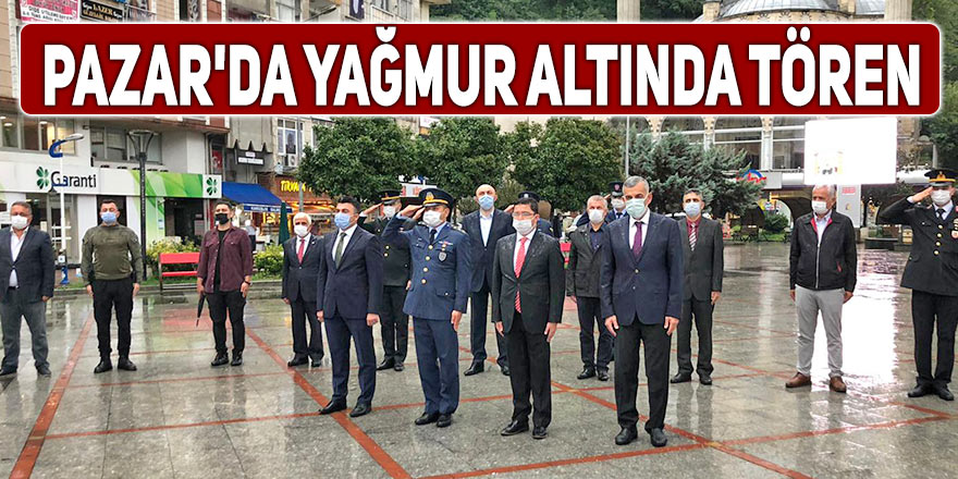 Pazar'da yağmur altında tören