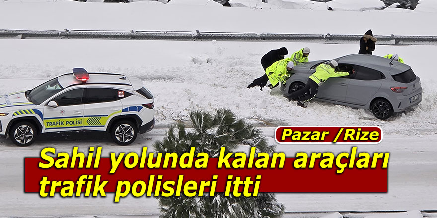 Sahil yolunda kalan araçları trafik polisleri itti