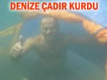 Sıcaktan bunalan Rizeli, denize çadır kurdu!