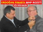 PAZAR'DA MHP'YE YENİ KATILANLARA ROZET