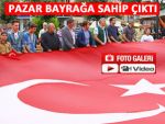 BAYRAK İNDİRME OLAYINA PAZAR'DA TEPKİ