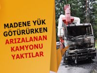 Madene yük taşırken arızalanan kamyonu yaktılar