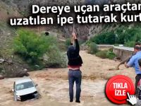 Dereye uçan araçtan uzatılan ipe tutarak kurtuldu