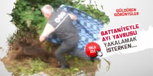 Battaniye ile yavru ayı yakalamak isterken!