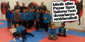 Minik eller Pazar Spor Salonunun duvarlarını renklendirdi