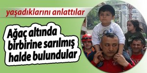 Ağaç altında birbirine sarılmış halde bulundular