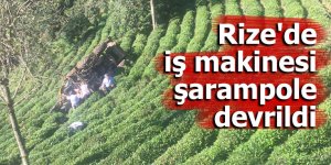 Rize'de iş makinesi şarampole devrildi