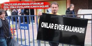 Tahliye edilen binada oturanlar özel izinle eşyalarını almaya başladı