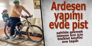 Ardeşenli baba sahilde gezmek isteyen kızı için bisiklet keyfini eve taşıdı