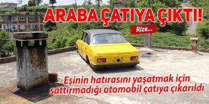 Eşinin hatırasını yaşatmak için sattırmadığı otomobil çatıya çıkarıldı