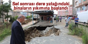 Sel sonrası dere yatağındaki binaların yıkımına başlandı