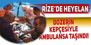 Dozerin kepçesiyle ambulansa taşındı!