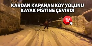 Kardan kapanan köy yolunu kayak pistine çevirdi