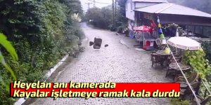 Heyelan anı kamerada: Kayalar işletmeye ramak kala durdu
