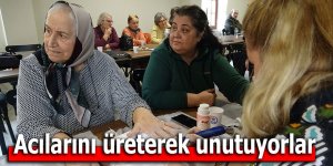 Acılarını üreterek unutuyorlar