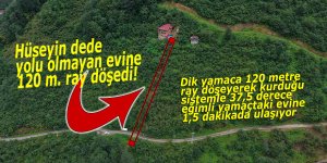 Hüseyin dede yolu olmayan evine ray döşedi!